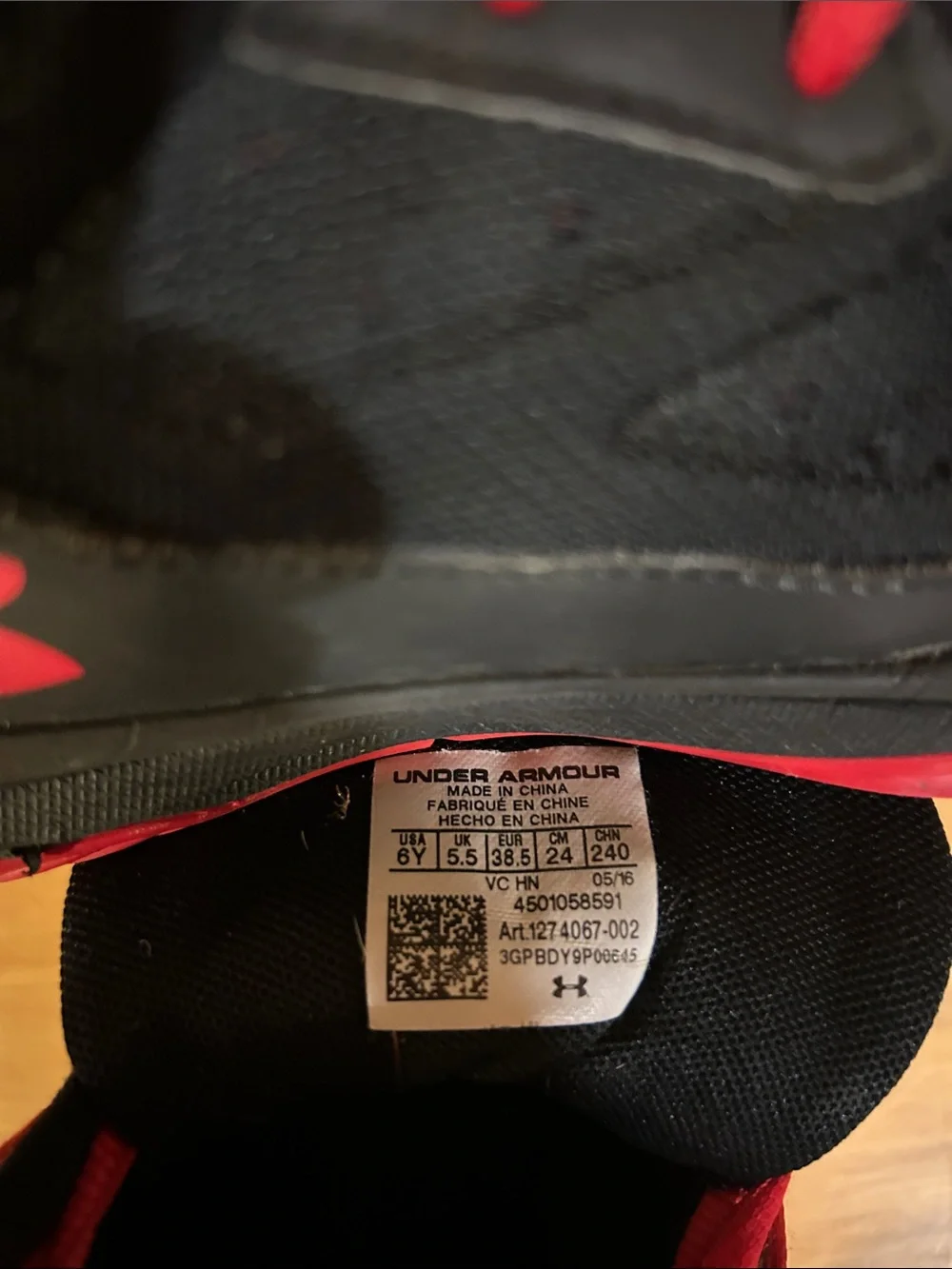 Under Armour Kids Black and Red Athletic Sneakers
